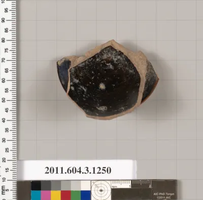 Terracotta fragment of a kyathos (cup-shaped ladle)