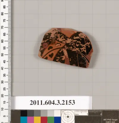 Terracotta fragment of a kylix (drinking cup)