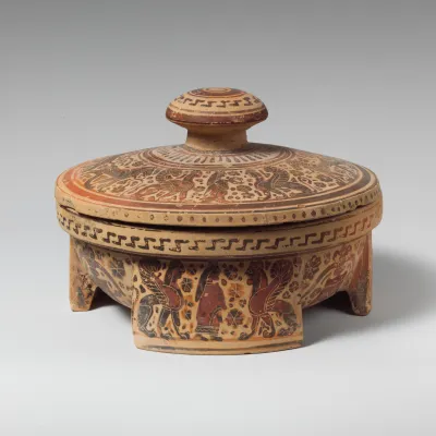 Terracotta tripod pyxis (box)