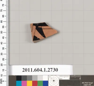 Terracotta fragment of a kylix (drinking cup)