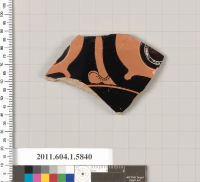 Terracotta fragment of a kylix: eye-cup  (drinking cup)