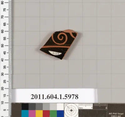 Terracotta fragment of a kylix (drinking cup)