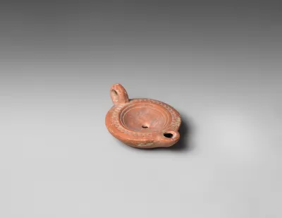 Terracotta oil lamp
