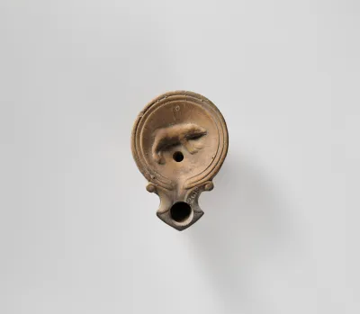 Terracotta oil lamp