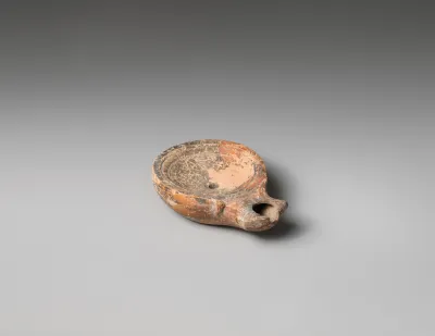 Terracotta oil lamp