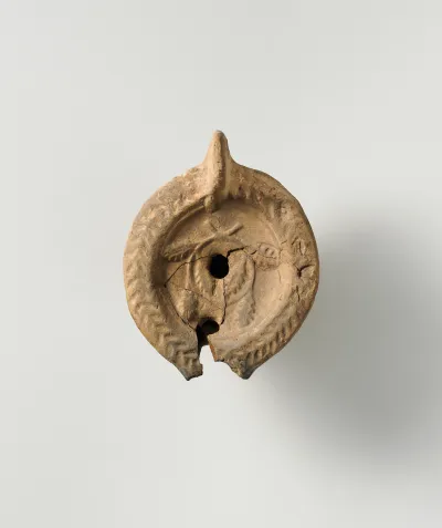 Terracotta oil lamp