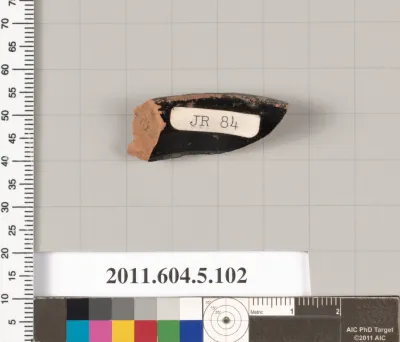 Terracotta fragment of a stemless kylix (drinking cup)?