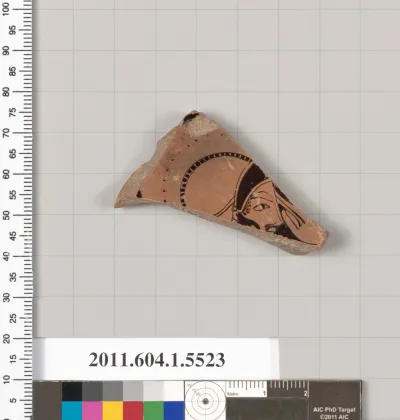 Terracotta fragment of a kylix (drinking cup)