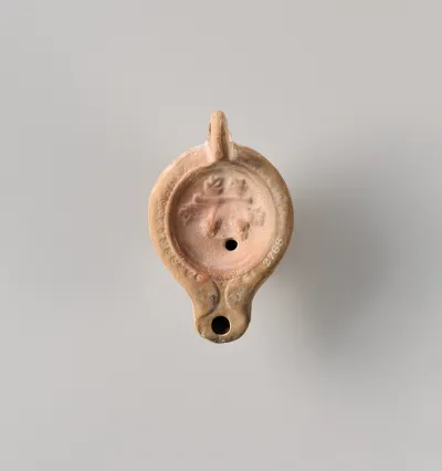 Terracotta oil lamp