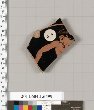 Terracotta fragment of a kylix (drinking cup)