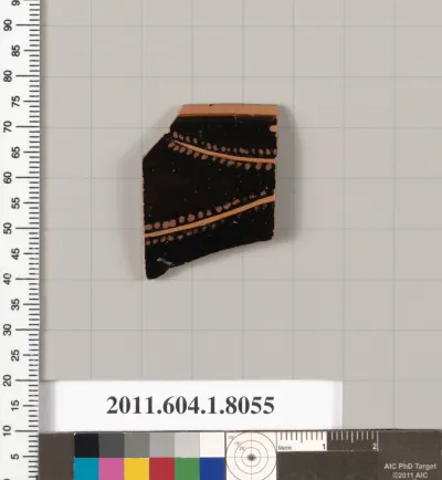 Terracotta rim fragment of a kylix (drinking cup)