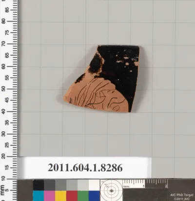 Terracotta rim fragment of a kylix (drinking cup)