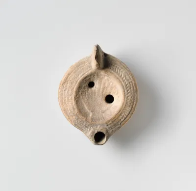 Terracotta oil lamp
