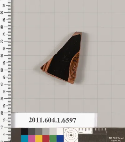 Terracotta fragment of a kylix (drinking cup)