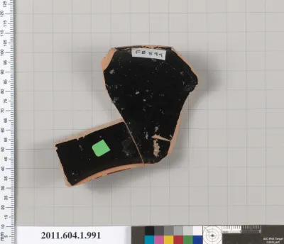 Terracotta fragment of a kylix (drinking cup)