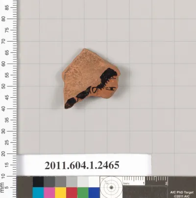 Terracotta fragment of a kylix (drinking cup)