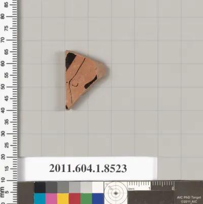 Terracotta fragment of a stemless kylix (drinking cup)