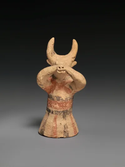 Terracotta figure wearing a bull mask