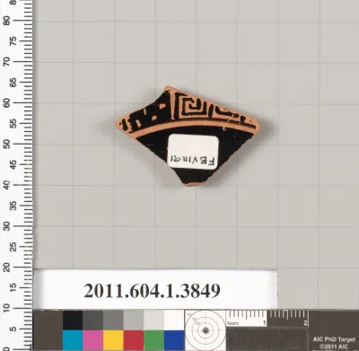 Terracotta fragment of a kylix (drinking cup)