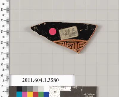 Terracotta fragment of a kylix (drinking cup)