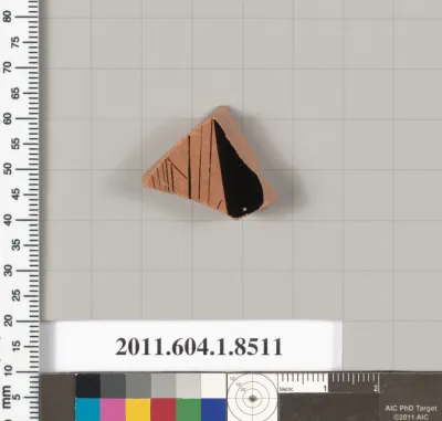 Terracotta fragment of a stemless kylix (drinking cup)