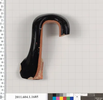 Terracotta fragment of a kylix (drinking cup)