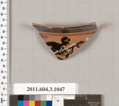 Terracotta fragment of a mastoid (drinking cup with narrow base)