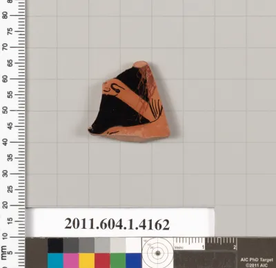 Terracotta fragment of a kylix (drinking cup)