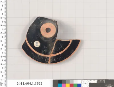 Terracotta fragment of a kylix (drinking cup)