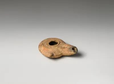 Terracotta oil lamp
