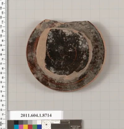 Terracotta fragment of a kylix (drinking cup)