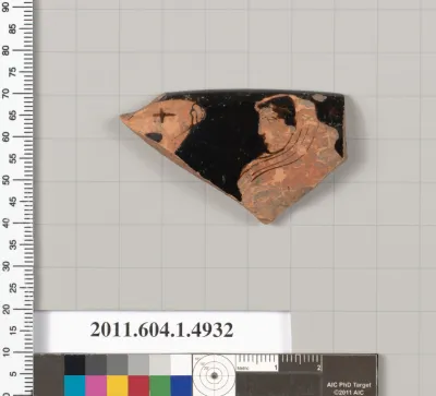 Terracotta rim fragment of a kylix (drinking cup)