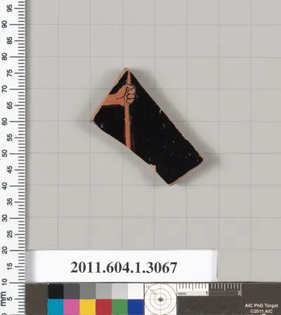 Terracotta fragment of a kylix (drinking cup)