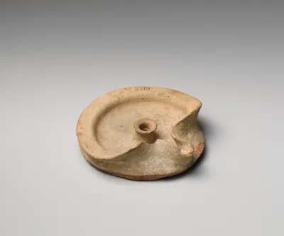 Terracotta saucer-shaped lamp