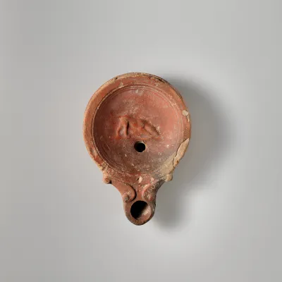 Terracotta oil lamp
