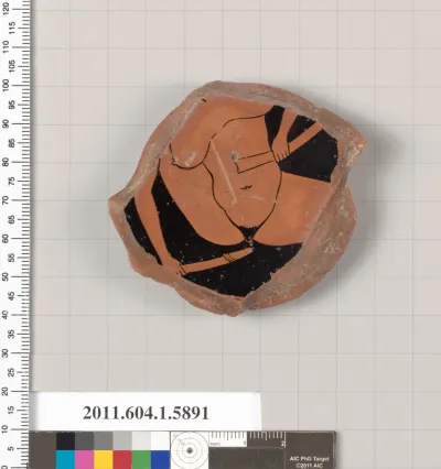 Terracotta fragment of a kylix (drinking cup)