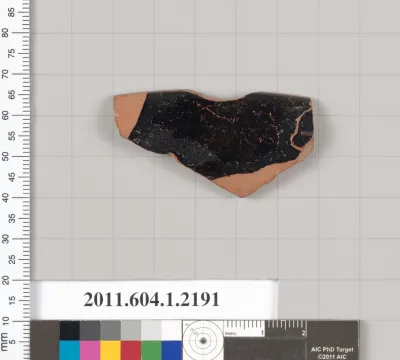 Terracotta rim fragment of a kylix (drinking cup)