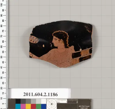 Terracotta fragment of a lebes gamikos (round-bottomed bowl with handles and stands used for weddings)?