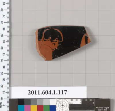 Terracotta rim fragment of a kylix (drinking cup)