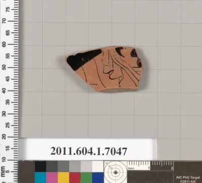 Terracotta fragment of a kylix (drinking cup)