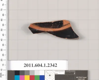 Terracotta fragment of a kylix (drinking cup)