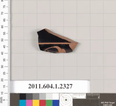 Terracotta fragment of a kylix (drinking cup)