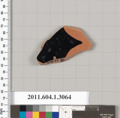 Terracotta fragment of a kylix (drinking cup)