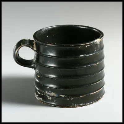 Terracotta mug with horizontal rills