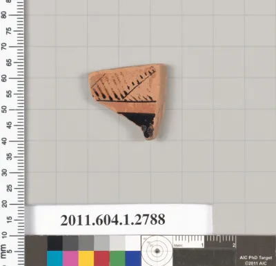 Terracotta fragment of a kylix (drinking cup)