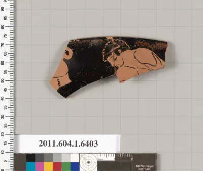 Terracotta fragment of a kylix (drinking cup)