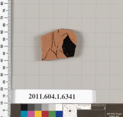 Terracotta fragment of a kylix (drinking cup)