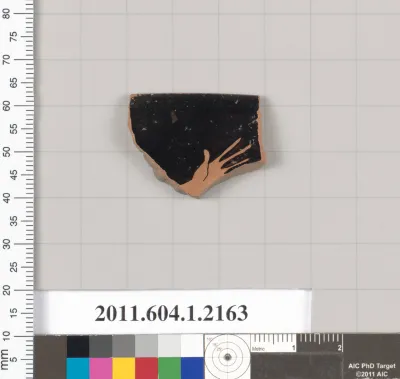 Terracotta rim fragment of a kylix (drinking cup)