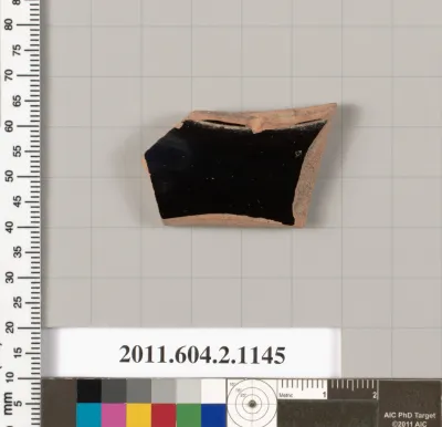 Terracotta fragment from a pyxis lid (box)