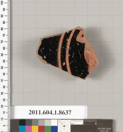 Terracotta fragment of a stemless kylix (drinking cup)